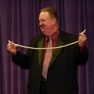 Dan Garrett performs a rope trick